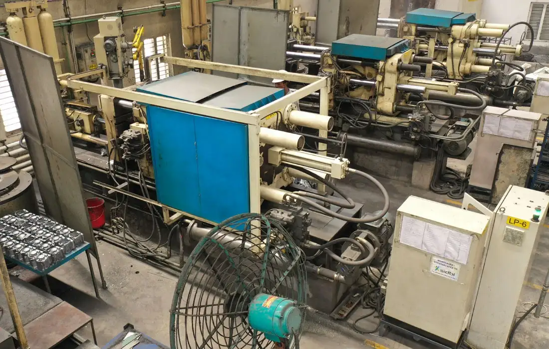 Die casting machine operating on the factory floor