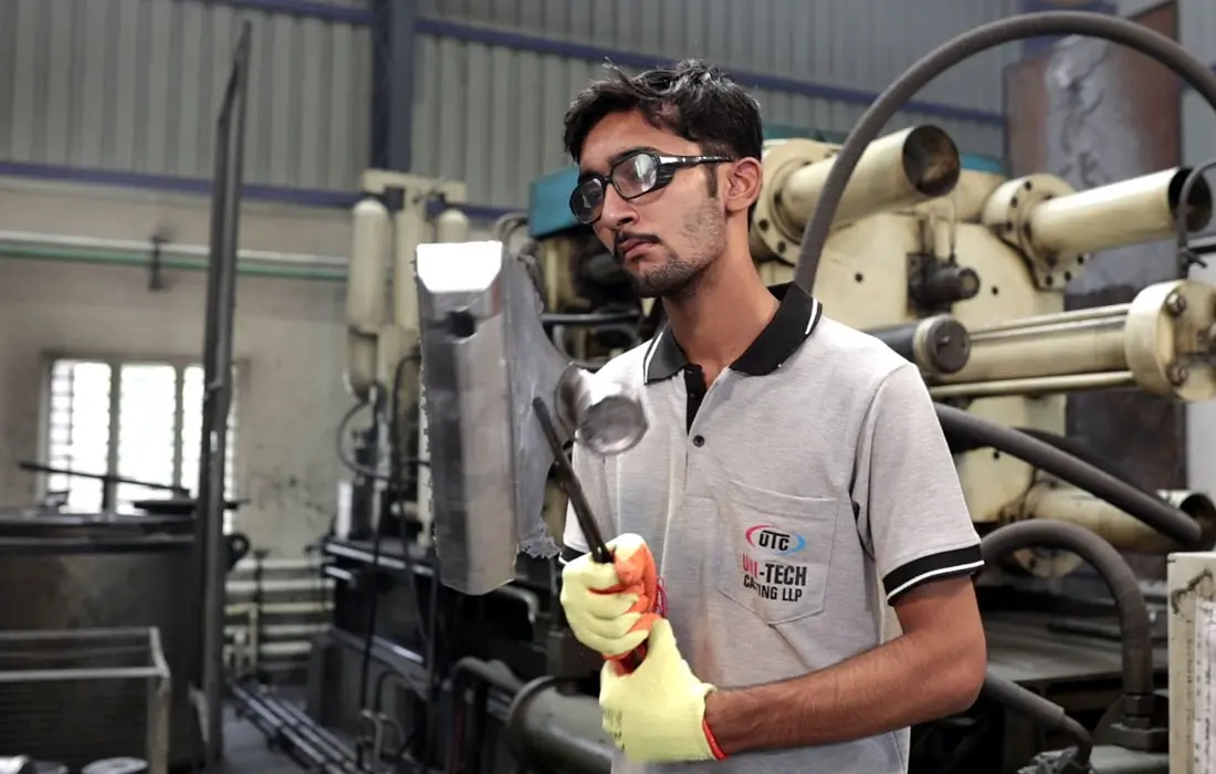 Manufacturing technician performing quality control inspection