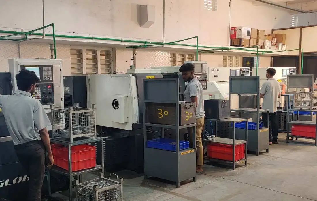 Shop floor view of CNC machines and operators