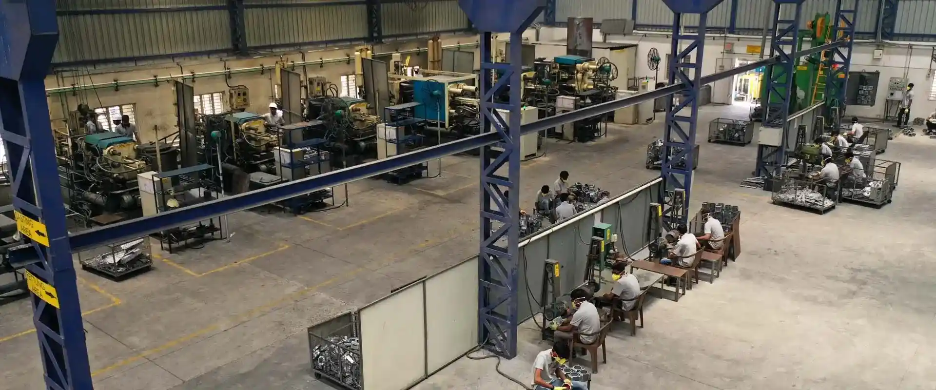 View of manufacturing facility with machinery and workers