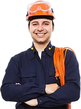 Industrial worker wearing safety helmet and holding equipment